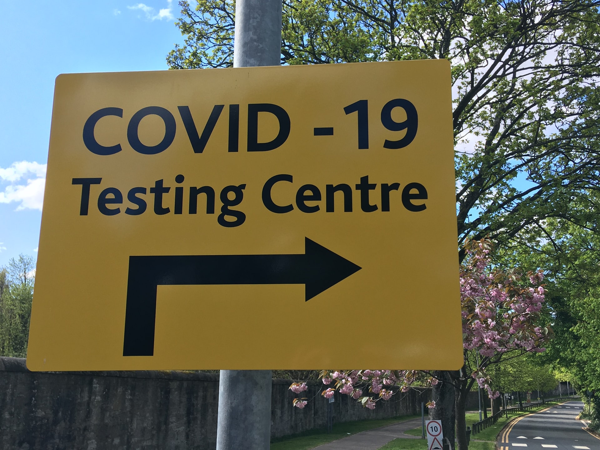 sign for COVID-19 testing center